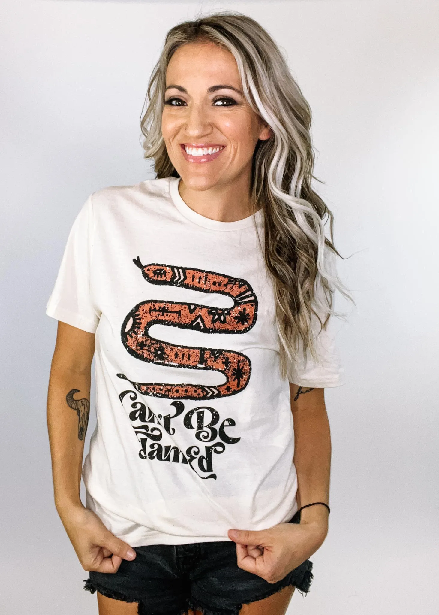 Can't Be Tamed Graphic Tee